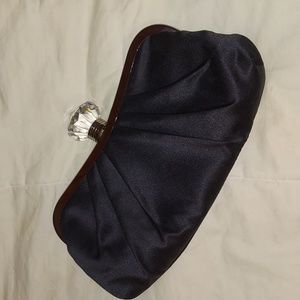 Kate Landry Elegant black clutch with crystal like clasp